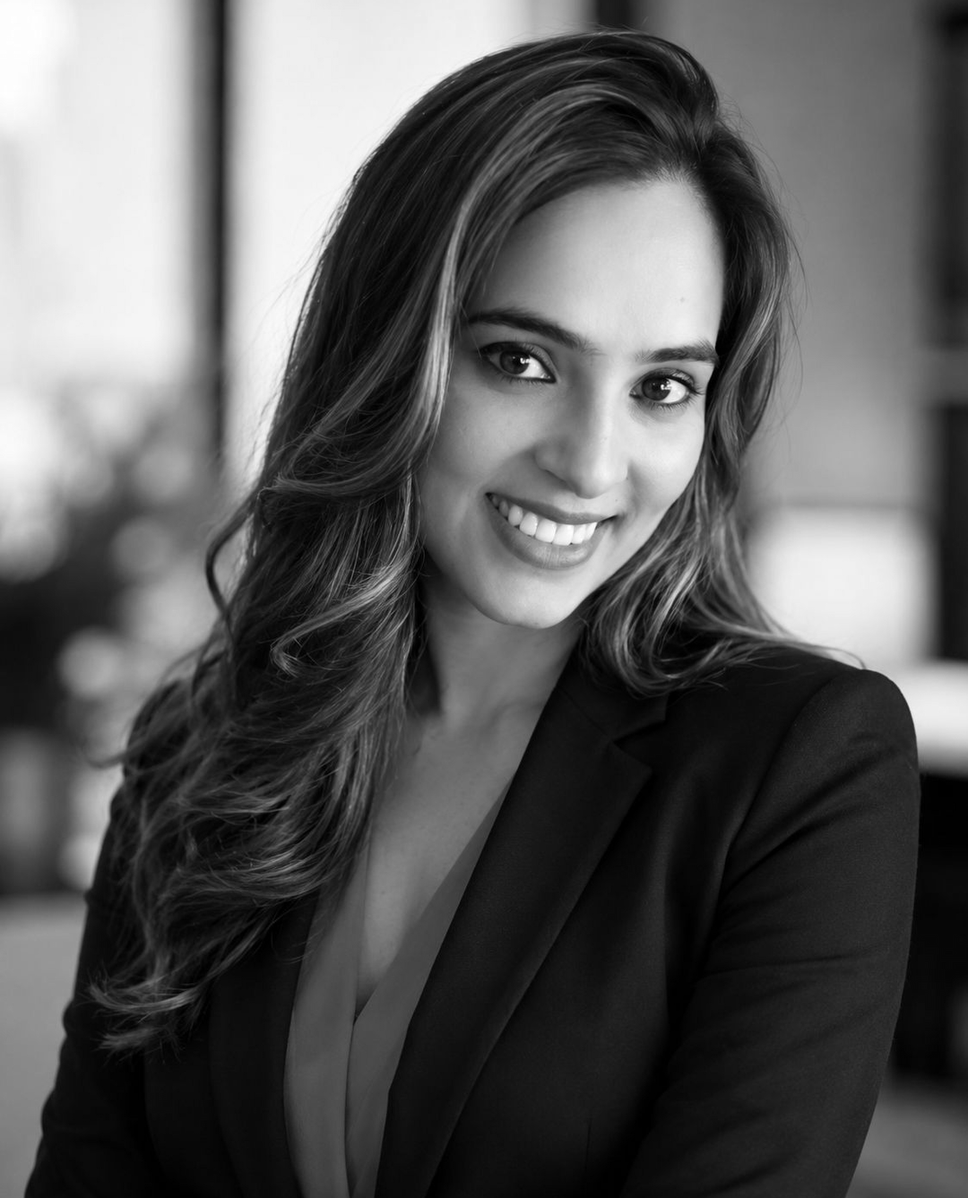 POONAM JAIN — Chief Operating Officer